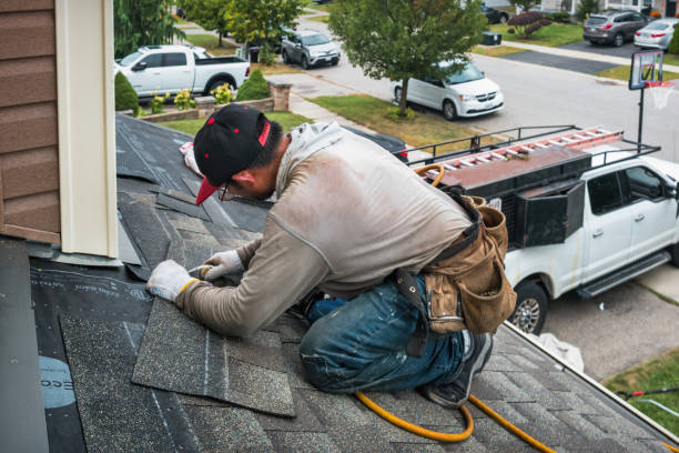 Professional Roofing technician working in Taunton, MA